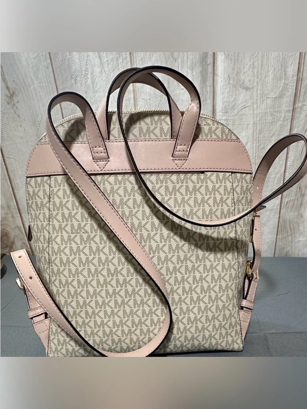 Michael Kors backpack logo